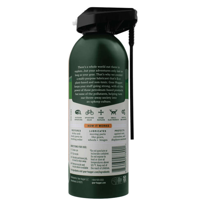 A green Gear Hugger aerosol spray can with a black cap features eco-friendly, non-toxic lubricant details for bicycles, cars, and household items. Illustrations of a bike, car, tools are shown with usage directions on the side. Product Name: Multi-Purpose Lubricant.