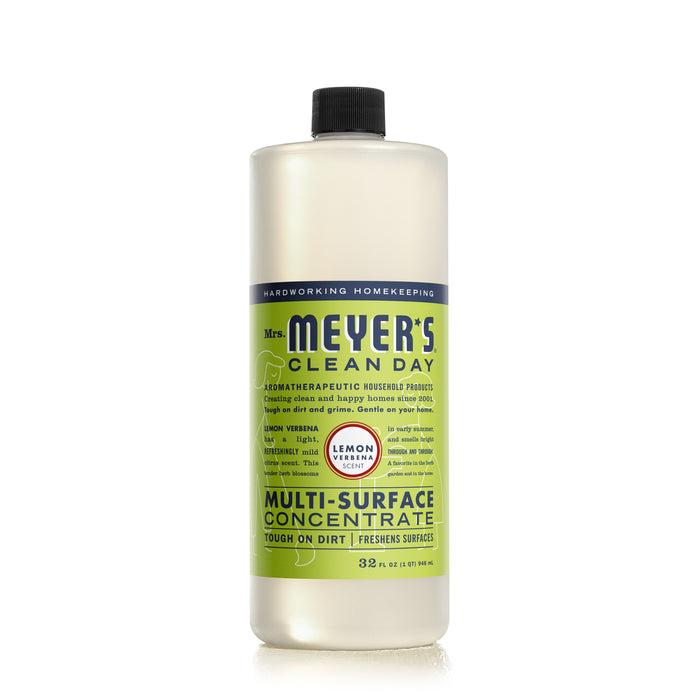 A 32 fl oz bottle of Mrs. Meyers Multi-Surface Concentrate in Lemon Verbena scent, with a pale green label featuring blue and white text, is infused with essential oils for aromatherapeutic cleaning.