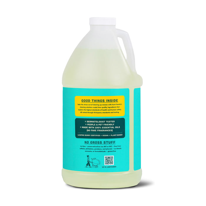 Aunt Fannies Multi-Surface Floor Cleaner comes in a large bottle with a turquoise label showcasing its plant-based, hypoallergenic formulation. The dermatologically tested cleaner is free from harsh chemicals, and a yellow section reads Good Things Inside.