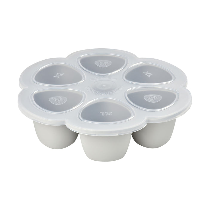 The BEABA Multiportions™ Silicone Baby Food Freezer Tray is a white, platinum-grade accessory with six compartments and transparent lids featuring a heart logo and XL. Its ideal for storing baby food and complements the Babycook for meal organization.