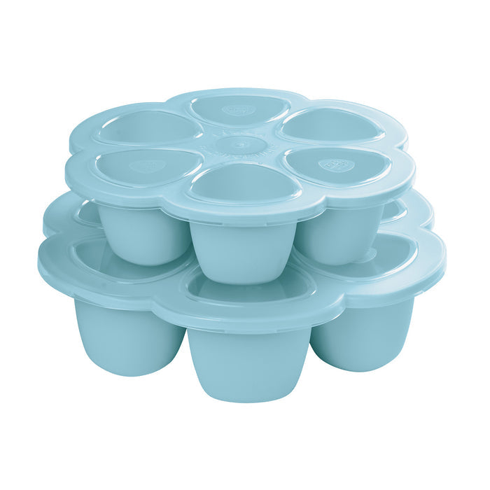 The BEABA Multiportions™ Silicone Baby Food Freezer Tray includes stacked blue flower-shaped trays made of platinum-grade silicone, each with rounded compartments and lids for seamless nesting, perfect for storing baby food.