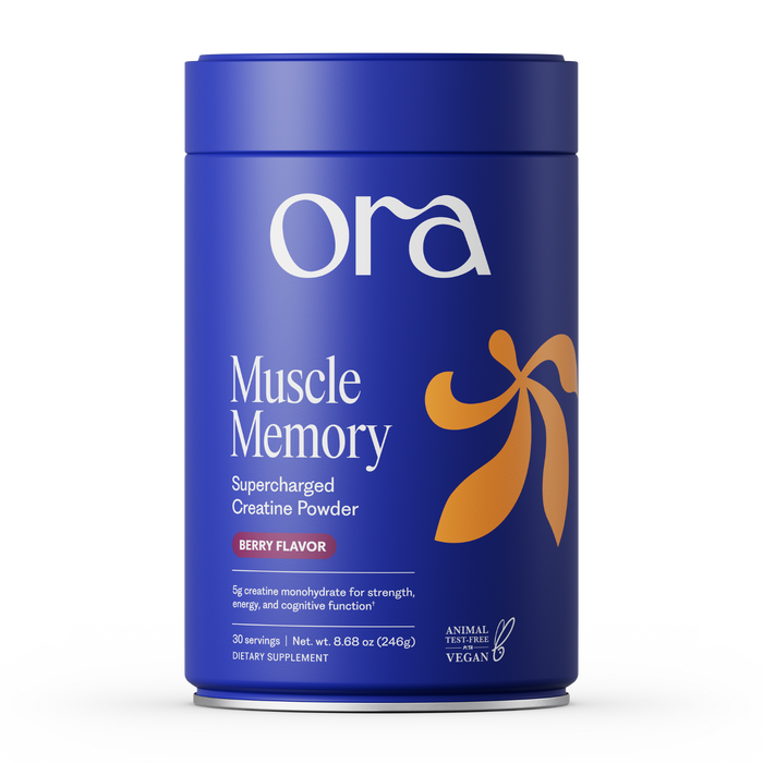 A blue cylindrical container of Ora Organic Muscle Memory: Supercharged Creatine Powder, Berry Flavor, with orange accents. The vegan, Informed Sport certified creatine monohydrate supports strength, energy, recovery, and cognition. 30 servings.