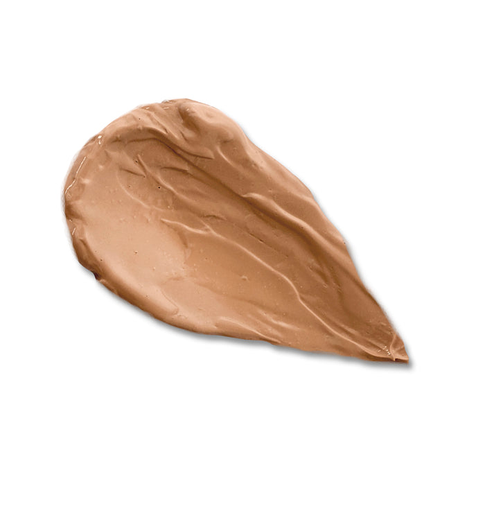 Lily Lolos Natural BB Cream features a creamy light brown swatch with a smooth texture against a white background.