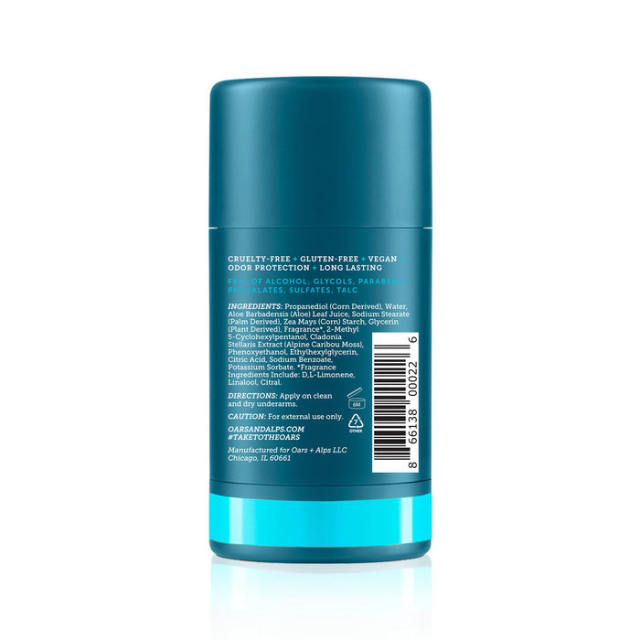 Oars + Alps Natural Deodorant comes in a turquoise, cylindrical, aluminum-free container with a label showing ingredients, directions, and claims such as cruelty-free, vegan, and odor-preventing—honored as a Mens Health Editors Choice.