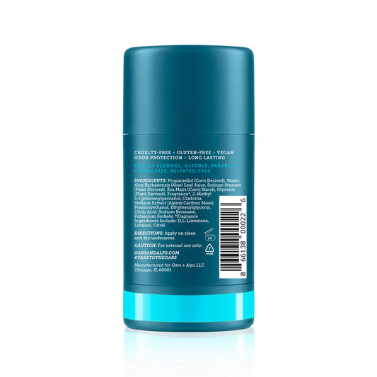 Oars + Alps Natural Deodorant comes in a turquoise, cylindrical, aluminum-free container with a label showing ingredients, directions, and claims such as cruelty-free, vegan, and odor-preventing—honored as a Mens Health Editors Choice.