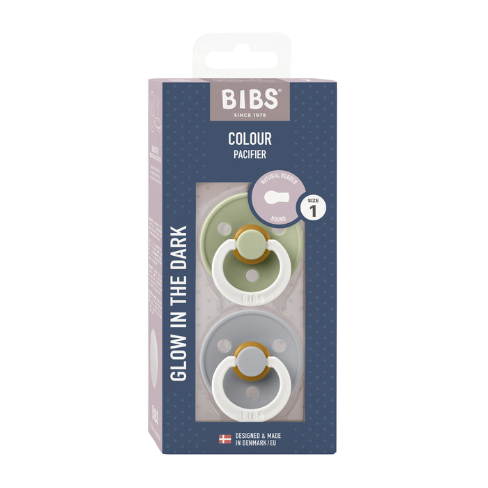 BIBS Natural Latex Rubber Glow in the Dark Pacifier in pastel green and blue contains two round, size 1 BPA-free pacifiers made from natural rubber. These are expertly crafted to support breastfeeding and feature Danish Design & Made in Denmark quality.
