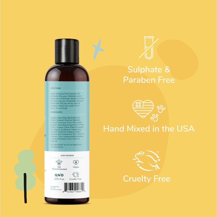 The kin+kind Natural Moisturizing Conditioner for Dogs & Cats features a teal label on a yellow background. Its sulfate & paraben-free, hand-mixed in the USA, cruelty-free, and represented by icons like a test tube, USA map with heart, and bunny.
