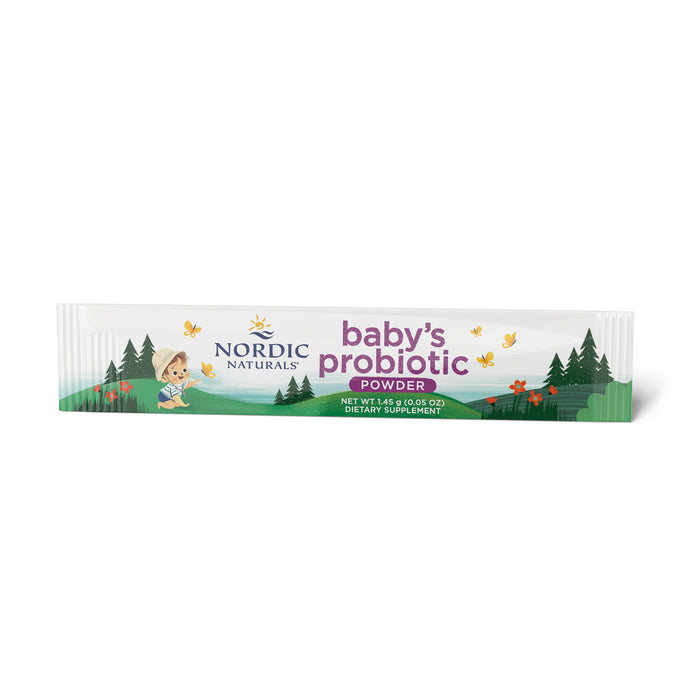 A 1.5g packet of Nordic Flora Babys Probiotic Powder by Nordic Naturals, featuring a cartoon baby in a meadow with trees, butterflies, and stars, emphasizes its role as a dietary supplement providing digestive support with beneficial probiotic strains.