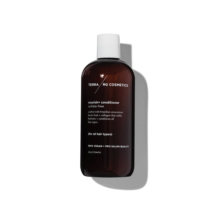 A dark brown bottle of Terra Beauty Bars Nourish+ Conditioner, vegan and sulfate-free, is shown on a white background. Featuring a white label with text, the 16 oz product suits all hair types and is enriched with Brazilian superfoods like amaranth. The design includes a white cap and detailing with shadow on the right.