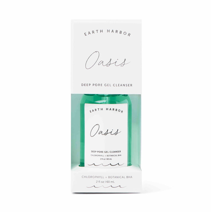 A 2 fl oz green bottle of Earth Harbors OASIS Deep Pore Gel Cleanser, spotlighting chlorophyll and botanical BHA for purifying, stands with its white box. Ideal for sensitive skin, it offers a refreshing cleanse.