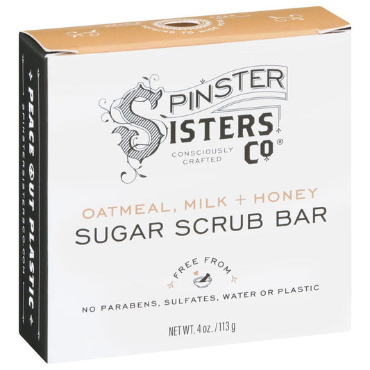 The Spinster Sisters Co. Oatmeal Milk & Honey Sugar Scrub Bar, a 4 oz box with a black and white design, is Consciously Crafted and plastic-free, containing no parabens, sulfates, or water.