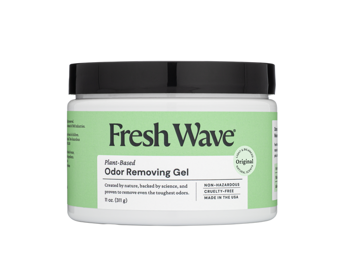 An 11 oz (311 g) jar of Fresh Wave Odor Removing Gel in white and green offers continuous odor control with natural plant oils. The label emphasizes its non-hazardous, cruelty-free nature, made in the USA.