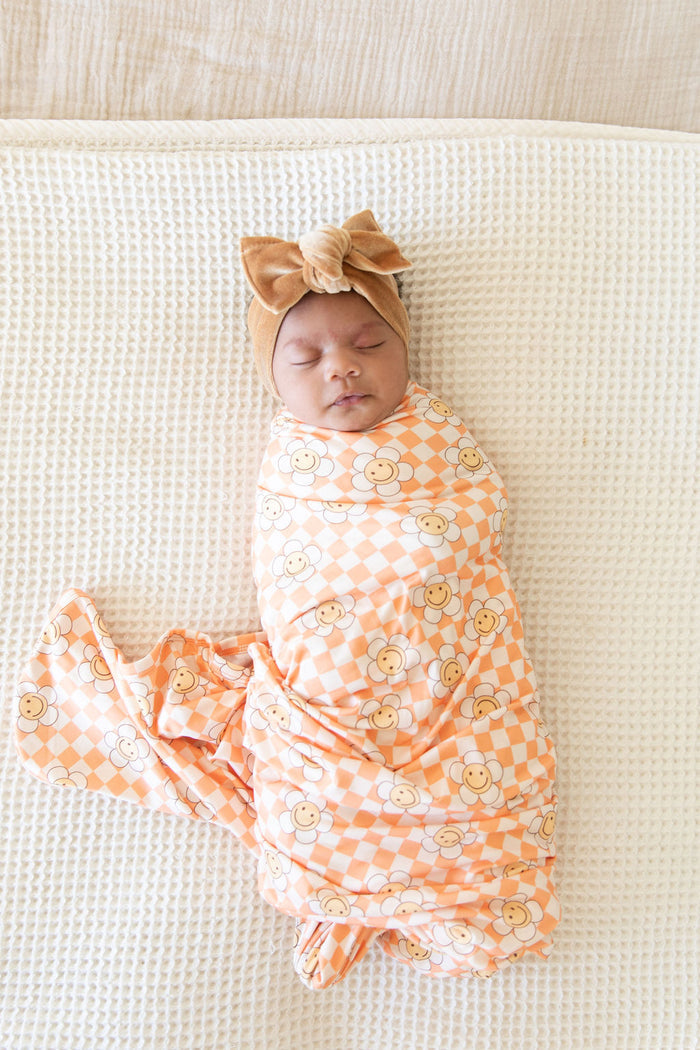 ORANGE SMILEY CHECKER | SWADDLE