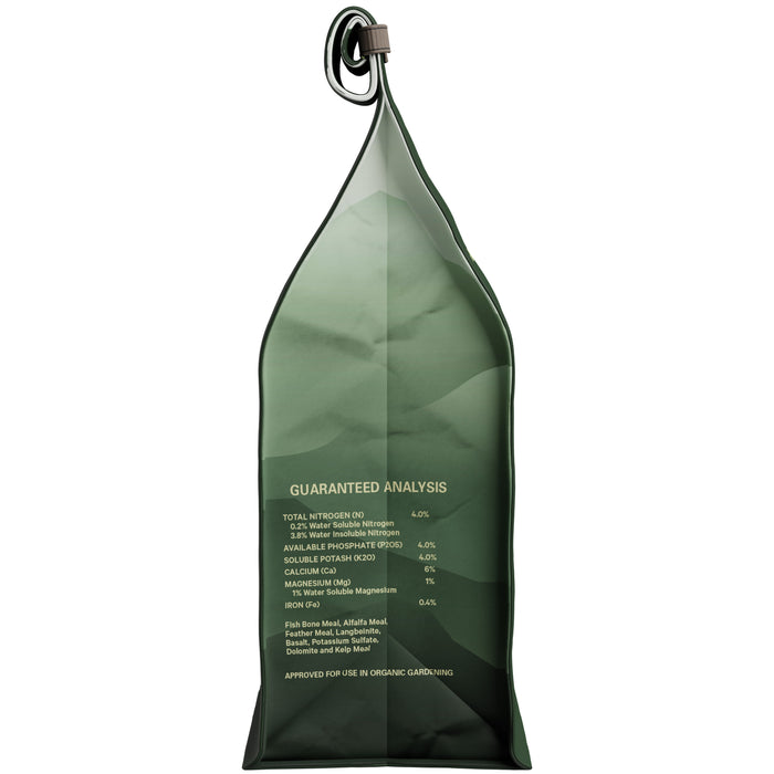 The Spade to Fork Organic All Purpose Fertilizer bag features a sleek green design with guaranteed analysis in white. It tapers at the top with a looped handle, highlighting organic nutrients perfect for enhancing soil fertility in organic gardening.