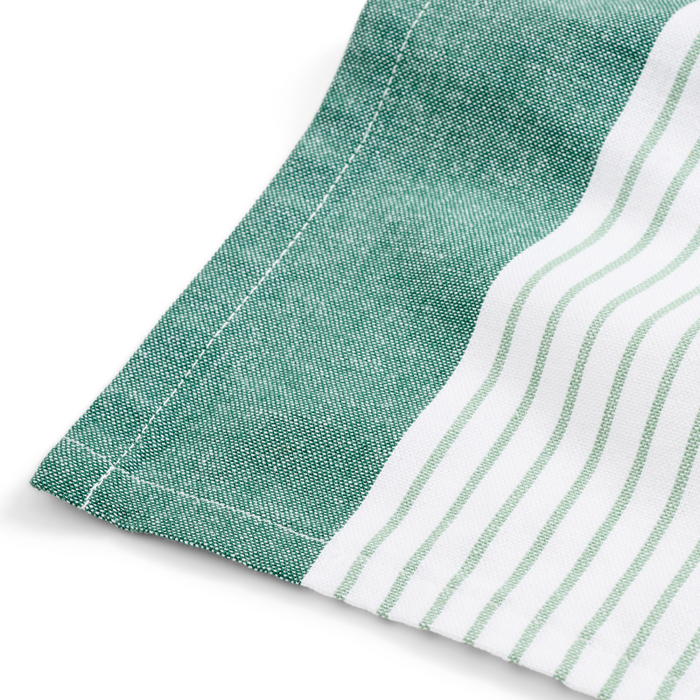 Grove Co.s Organic Cotton Striped Kitchen Towels feature a green textured section on the left with parallel green stripes on a white background to the right, neatly stitched at the corner for quick-drying tasks.