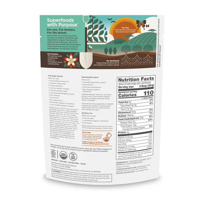 Back view of Navitas Organics Organic Goji Berries package features a white design with green accents, highlighting ingredients and antioxidant benefits. It includes a nutritional facts table, plant illustrations, and a heart logo at the top.