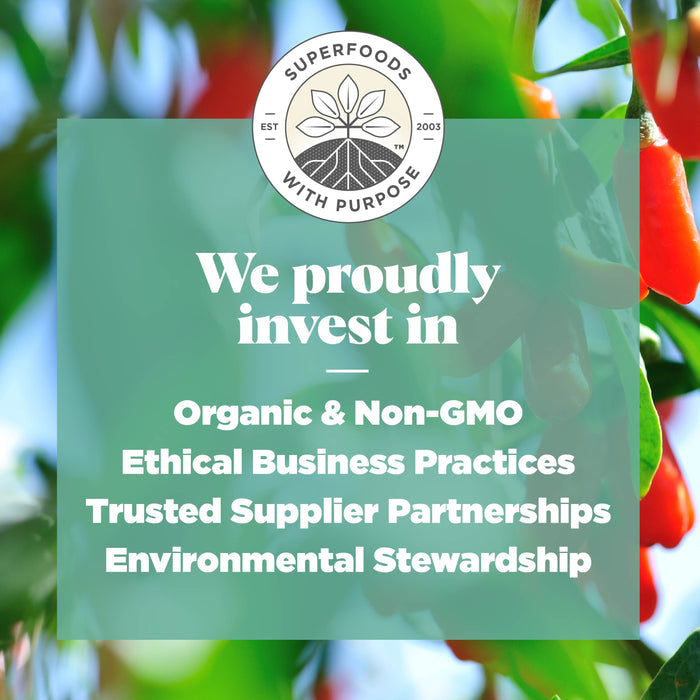 Aerial view of farmland with a green overlay. Text on the overlay reads: "We proudly invest in Organic &amp; Non-GMO, Ethical Business Practices, Trusted Supplier Partnerships, Environmental Stewardship." Superfoods with Purpose logo is at the top.