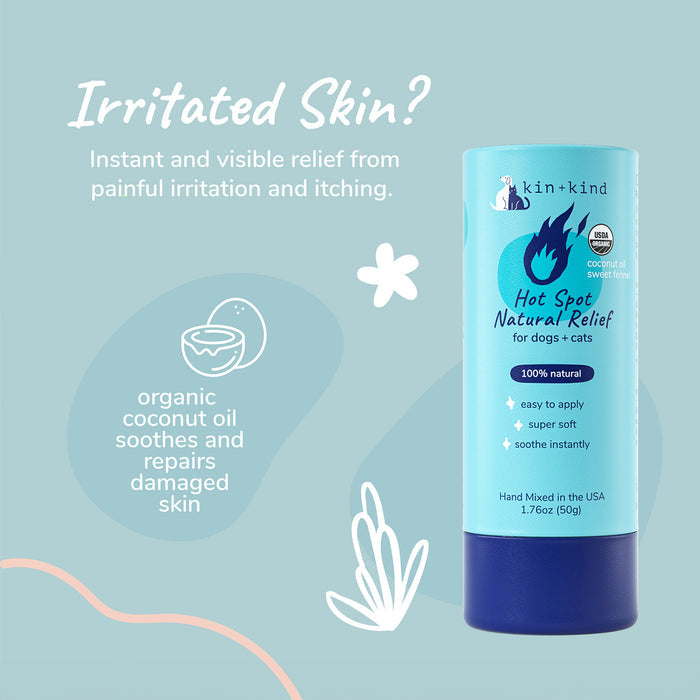 A blue cylindrical container labeled kin+kind displays the Organic Hot Spot Relief Stick for Dogs & Cats. Features highlighted in text include organic coconut oil, vet-tested pet care, easy application, super softness, and instant soothing. Background features a paw print and leaf illustrations.