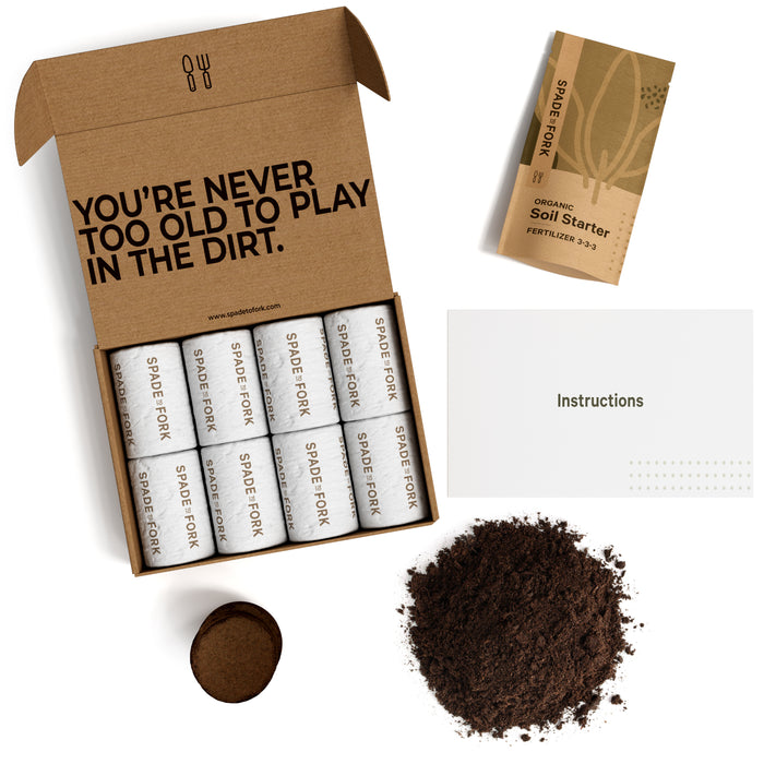 Open Spade to Forks Organic Indoor & Outdoor Potting Soil Multi-Pack featuring six seed rolls in a box, an organic soil packet, instructions, a peat pot, and beneficial microorganisms. The box says, Youre never too old to play in the dirt, perfect for diving into gardening!.