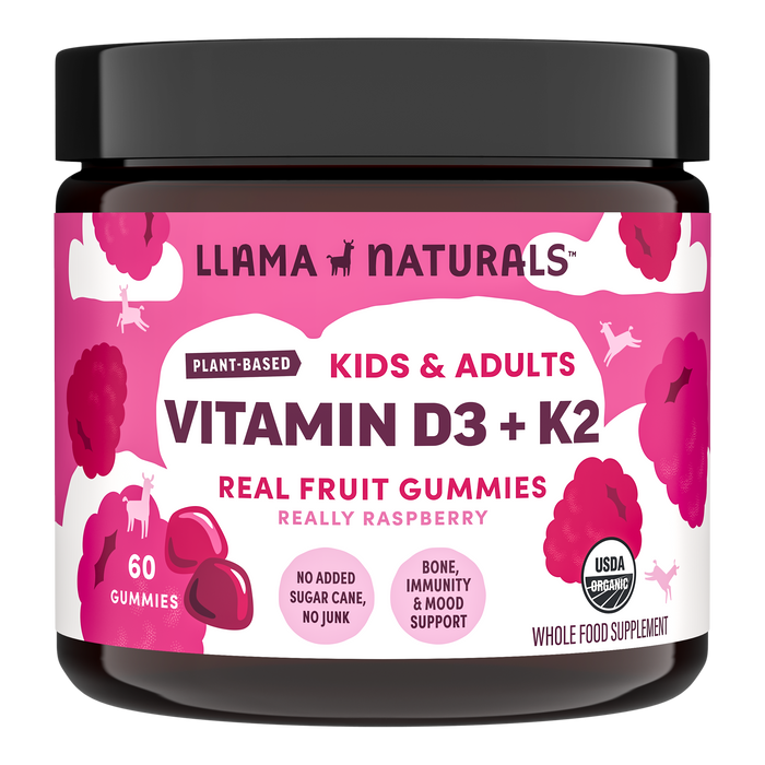 A jar of Llama Naturals Organic Kids & Adults Vitamin D3 + K2 Gummies, with a pink and white label featuring raspberry illustrations, showcases plant-based vitamin D, organic ingredients, no added sugar, and bone support benefits.