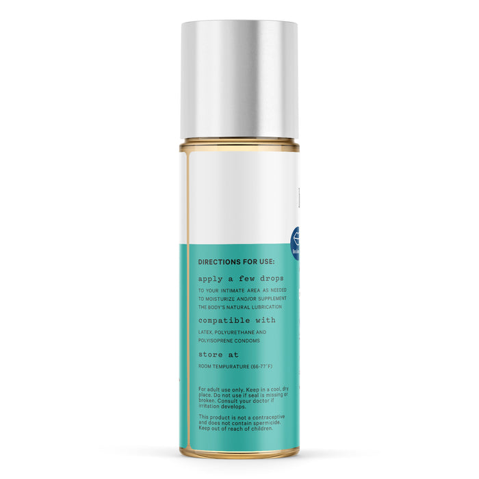 A bottle with a silver cap features a teal and white label that reads Organic Lubricant by The Honeypot Company. It includes usage instructions, compatibility details, suggests applying a few drops of the Agave Extract-infused formula, and storing at room temperature.