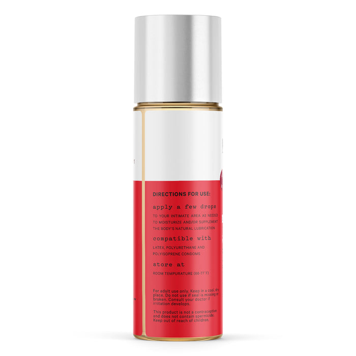 A cylindrical bottle featuring a gold cap and a red and white label, showcasing The Honeypot Companys Organic Lubricant. The herbal lube formula is enriched with organic moisturizing ingredients and is compatible with latex, polyurethane, and polyisoprene condoms for added comfort.