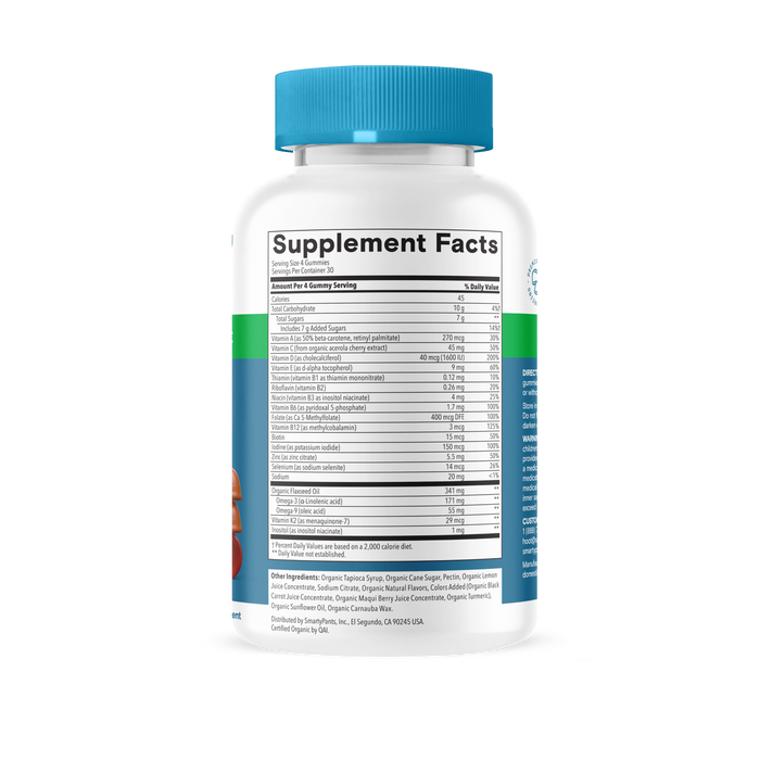 A white plastic supplement bottle with a blue cap, showing the Supplement Facts label and ingredients list. The label lists vitamins, minerals, omegas, and other nutrients per serving in black text on a white background, highlighting its formulation as SmartyPants Organic Men’s Multi & Omegas Gummies— a vegetarian multivitamin designed for daily nutritional support.