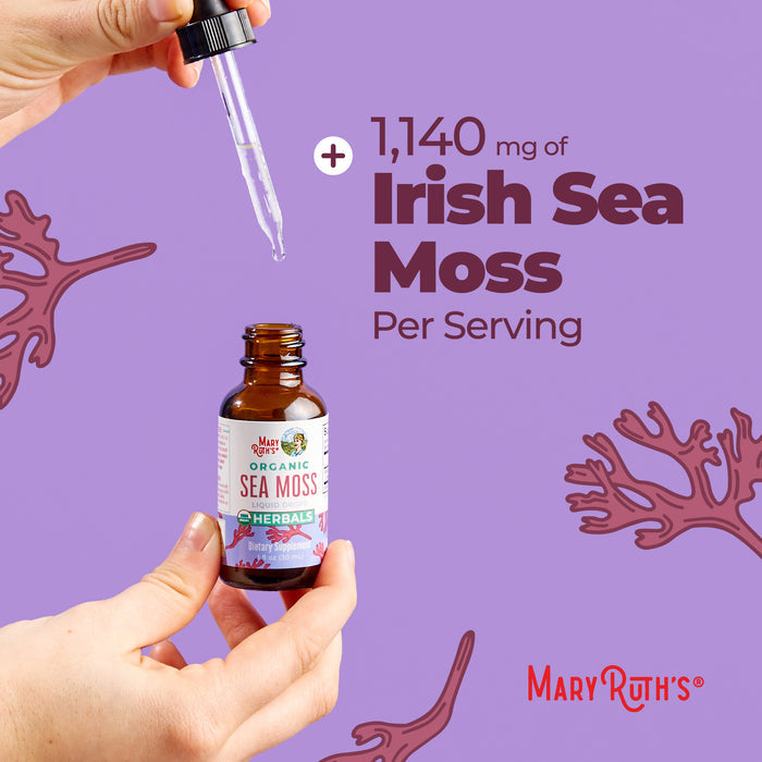 A hand holds a dropper above a bottle labeled MaryRuth's Organic Sea Moss Liquid Drops, with text beside it reading "+1,140 mg of Organic Irish Moss Per Serving" on a purple background featuring seaweed illustrations.