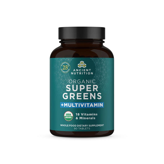 A dark bottle featuring the name Organic Super Greens + Multivitamins from Ancient Nutrition displays 25+ Superfoods and 18 Vitamins & Minerals. Its green label, accented with white and blue text, highlights USDA Organic and Non-GMO Project Verified logos, supporting healthy digestive function.