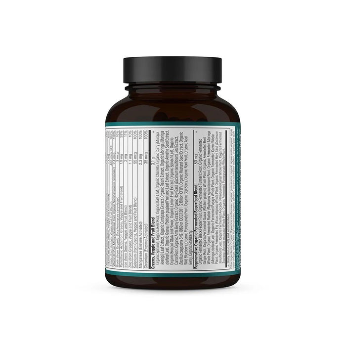 On a white background, a dark brown bottle with a black cap showcases the Organic Super Greens + Multivitamins by Ancient Nutrition, featuring a white label detailing vitamins and minerals for digestive health.