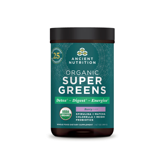 Ancient Nutritions Organic Super Greens dietary supplement features a vibrant green label promoting healthy detox, digestive health, and energy support with organic superfoods like spirulina, matcha, chlorella, reishi, and probiotics. Available in berry flavor.