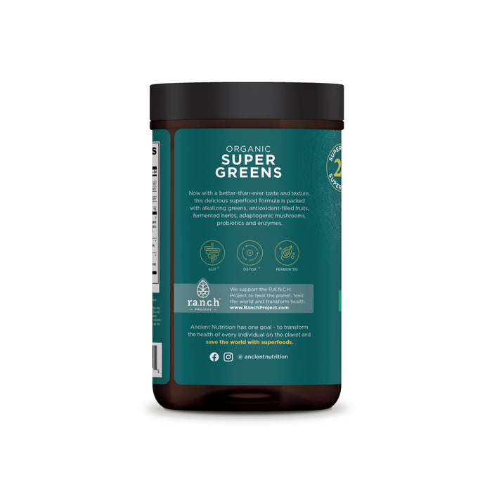 A jar of Ancient Nutritions Organic Super Greens powder features a green label highlighting detox benefits, probiotics, and adaptogenic mushrooms. It displays non-GMO and USDA organic certifications, promotes sustainability, and includes social media icons.