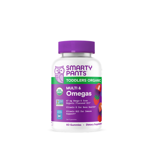A bottle of SmartyPants Organic Toddler Formula featuring a white label, purple cap, and fruit illustrations. The packaging prominently displays the USDA organic certification and highlights essential vitamins, making it an excellent choice for parents seeking organic nutrition for their toddlers.