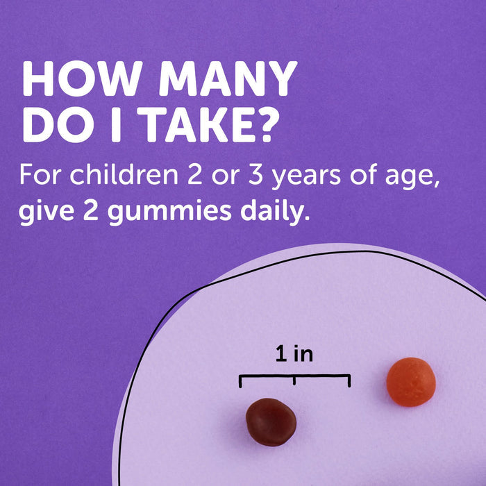 On a purple background, text asks, HOW MANY DO I TAKE? It advises children aged 2-3 enjoy 2 gummies daily. An image shows two gummies, one red and one orange, with a scale marked 1 in. These delightful SmartyPants Organic Toddler Formula vitamins are fun and nutritious.