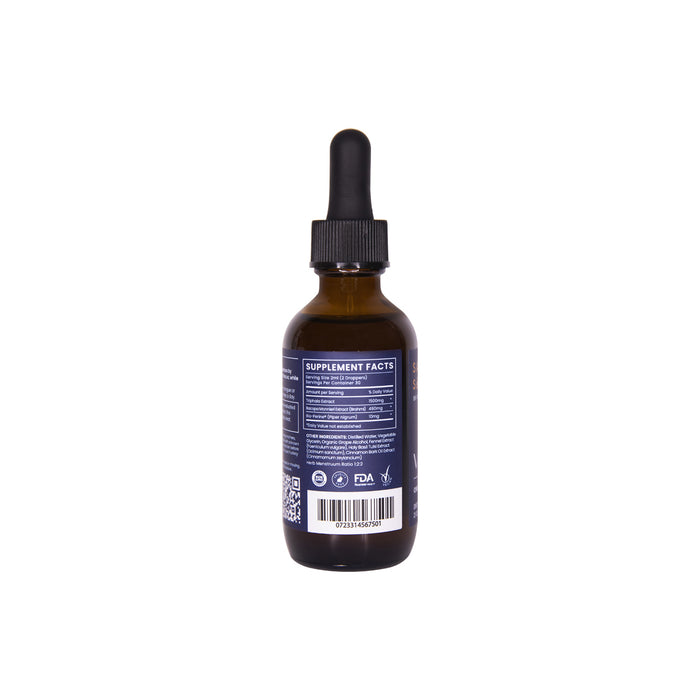 A dark brown glass dropper bottle with a black cap and a back label displaying supplement facts, a QR code, and FDA/cruelty-free certifications. Sattva Souls Organic Vata Tincture - Calming combines Ayurvedic herbs to balance the Vata Dosha. Plain white background.