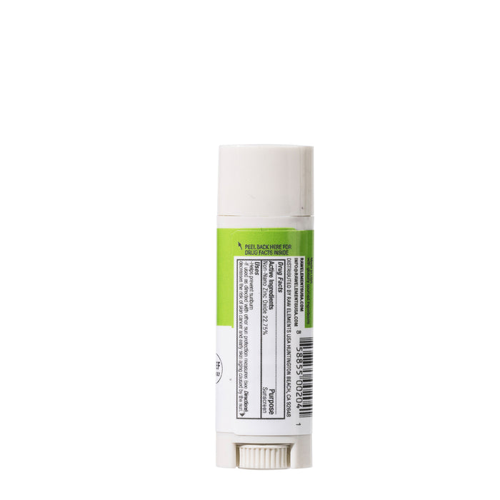 The Outdoor Lip Rescue - SPF 30 by Raw Elements is in a cylindrical tube with a green label detailing its all-natural ingredients and a barcode. It features a white cap, sunscreen for lips, and stands vertically against a white backdrop.