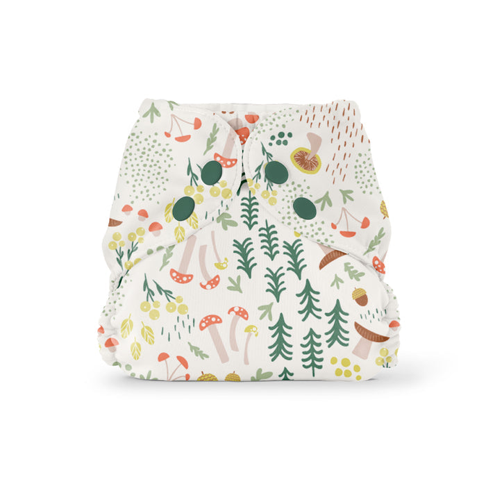 Explore the enchantment of Esembly Babys Outer Diaper Cover + Swim Diaper. This Size 2 diaper, made from 100% OEKO-TEX Certified Recycled Fabric, features a whimsical forest theme with mushrooms, leaves, and berries in earthy tones and green snaps on a light background—stylish and eco-friendly.