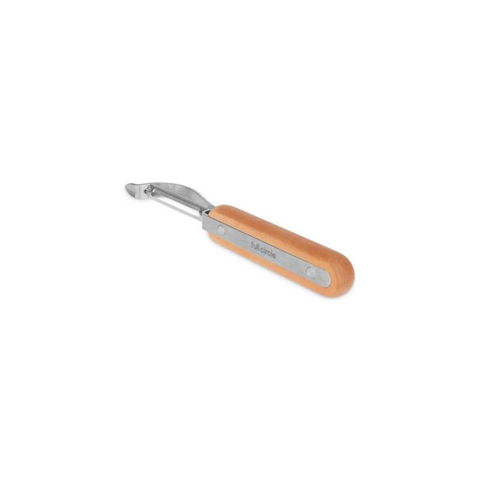The Full Circle Peeler is a metal vegetable peeler with an ergonomically designed wooden handle and a curved stainless steel blade. Its handle is smooth, featuring Full Circle engraved on a metal strip, and it is dishwasher safe for easy cleaning.