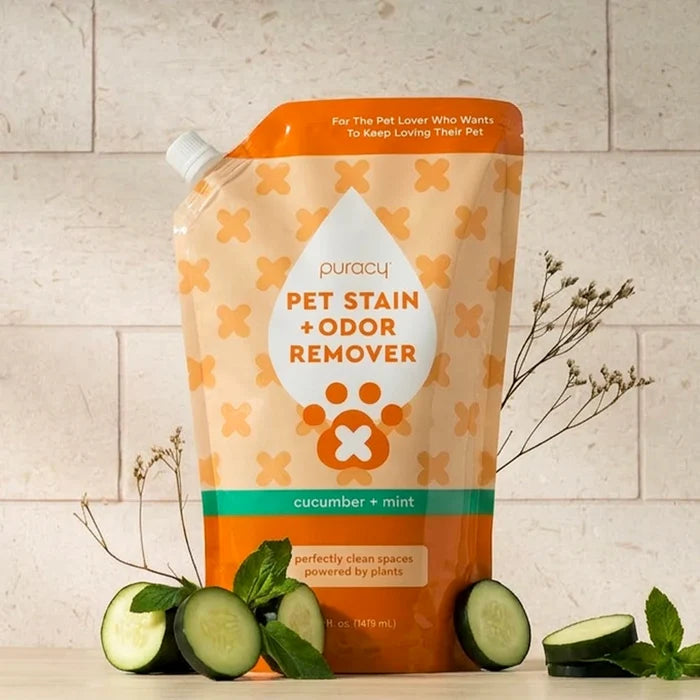 Pet Stain & Odor Remover pouch with cucumber slices and mint leaves for odor elimination.