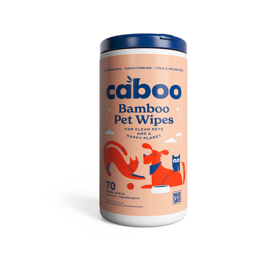 A cylindrical container of Caboo Pet Wipes features an orange dog and cat, highlighting its deodorizing and conditioning formula. It contains 70 tree- and nylon-free hypoallergenic wipes, perfect for pets.
