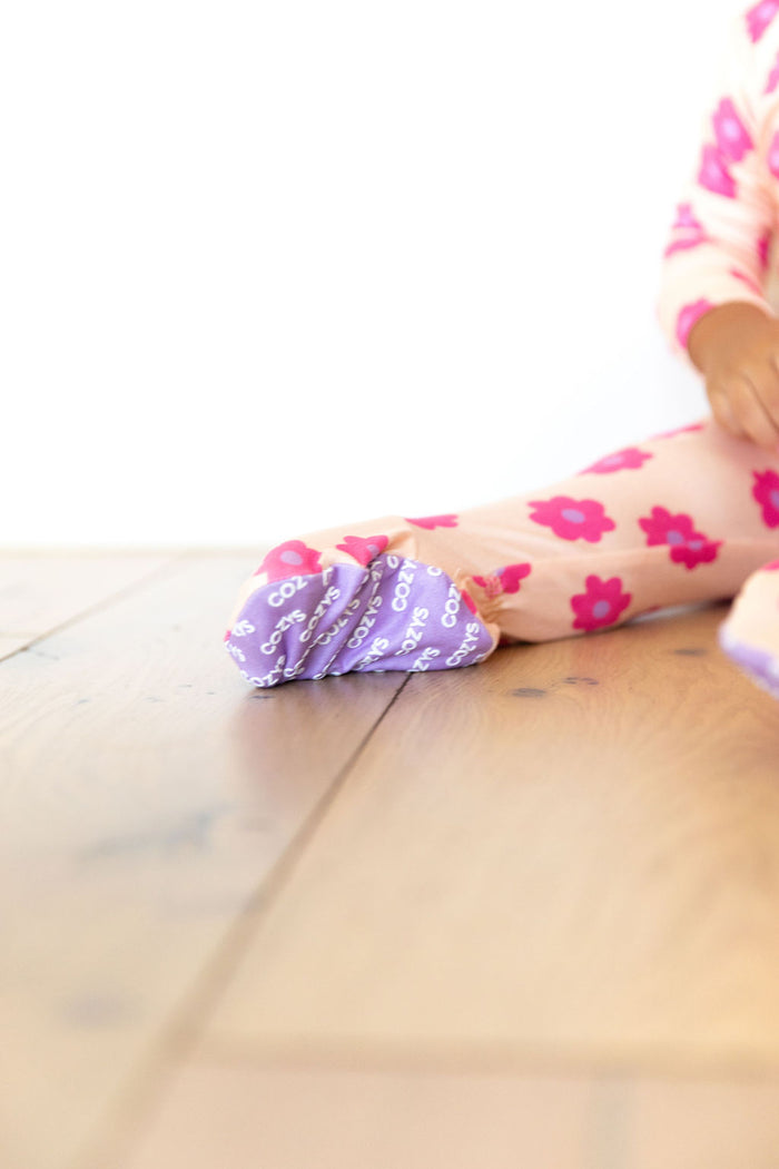 PINK DAISY | FOOTIE ONE PIECE