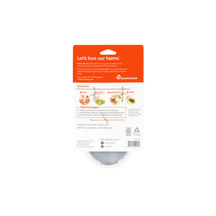 The image shows the back of a Full Circle Pizza Wheel package, highlighting its eco-friendly design and care guidelines. Made of paper with a recycled plastic safety cover, it features a bright orange top with white text emphasizing its sustainability.
