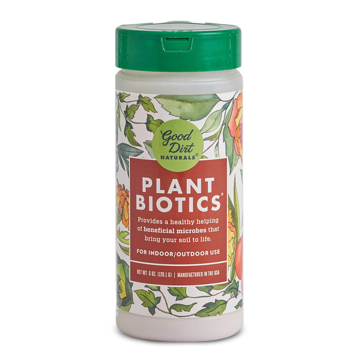 An 8-ounce container of Good Dirts PlantBiotic Indoor/Outdoor Nutrient Boost, adorned with a floral label, claims to enrich soil health using beneficial microbes to enhance root development and nutrient uptake for all plants.