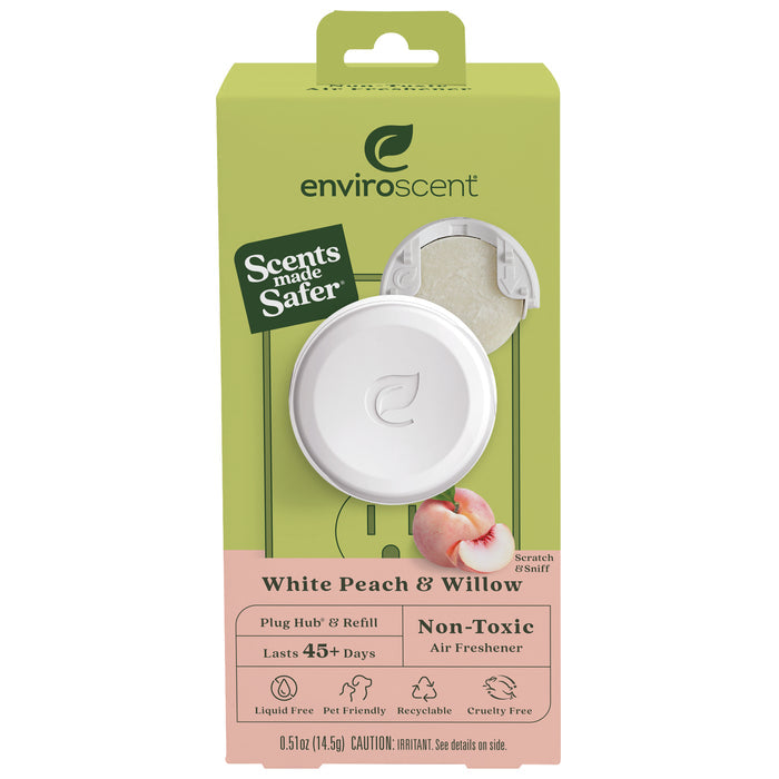 The Enviroscent Plug-In Air Freshener Kit - Grove Exclusive, in a green and white package, includes a plug hub and scent pod refill in white peach and willow. Lasting over 45 days, its non-toxic, liquid-free, spill-free, recyclable, cruelty-free, and among the best plug-in air fresheners.