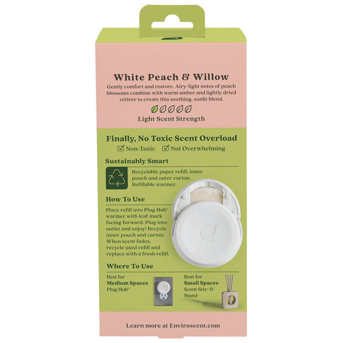Packaging for the Enviroscent White Peach & Willow scent pod refill highlights its light scent strength and non-toxic ingredients. Usage instructions recommend it for medium spaces with plug-in air fresheners or small spaces using a stick and stand. Comes as part of the Grove Exclusive Plug-In Air Freshener Kit.