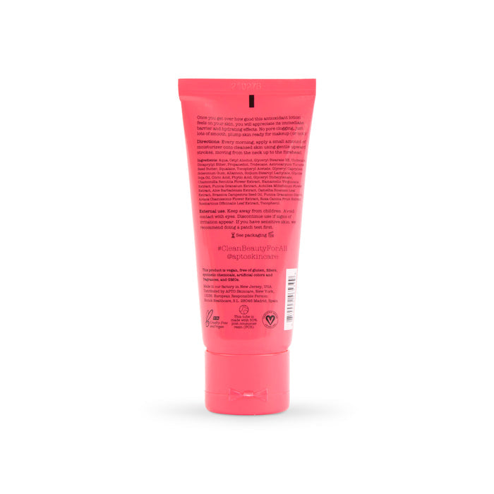 A pink tube of APTO Skincares Pomegranate Moisturizer with Squalane, a cruelty-free, lightweight antioxidant lotion, stands upright against a plain white background showcasing text on the back.