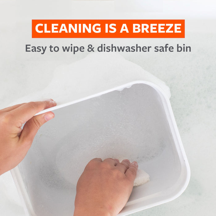 A person cleans a white bin with a sponge under soapy water. The image includes text saying, "CLEANING IS A BREEZE" and "Easy to wipe &amp; dishwasher safe bin.