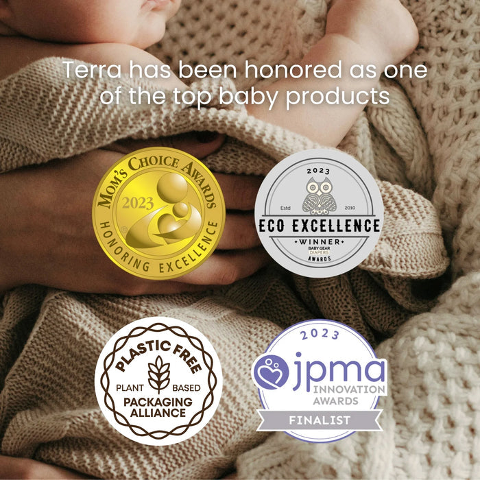 A baby wrapped in a knitted blanket is featured. Four award logos are displayed: Mom's Choice Awards 2023, Eco Excellence Winner 2023, Plastic-Free Plant-Based Packaging Alliance, and JPMA Innovation Awards 2023 Finalist. Text reads "Terra has been honored as one of the top baby products.