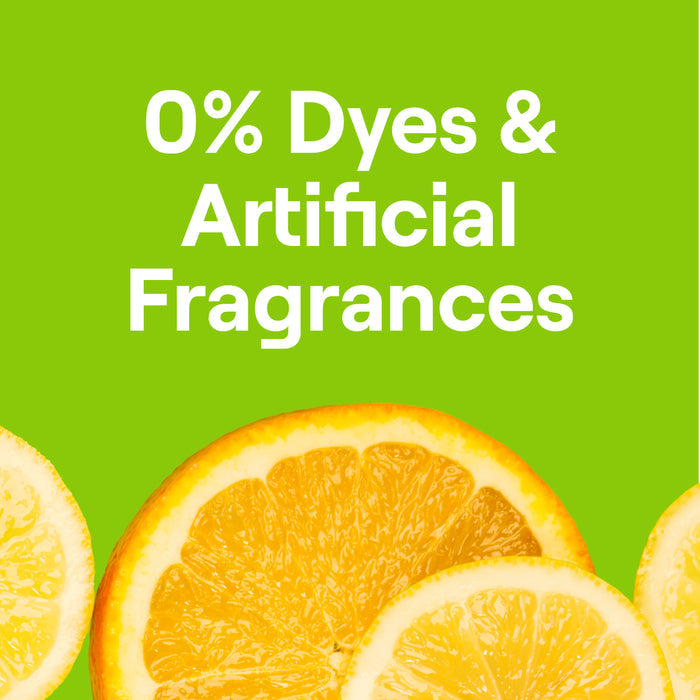 A bright green background with white text reads 0% Dyes & Artificial Fragrances. Slices of orange and lemon highlight the citrus freshness of Seventh Generation Power+ Dishwasher Detergent Packs.
