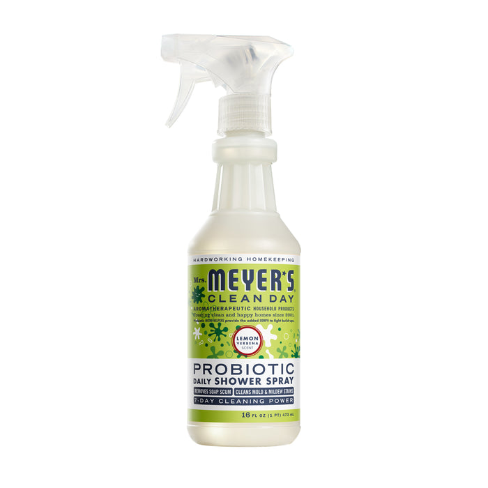 A 16 fl oz bottle of Mrs. Meyers Probiotic Daily Shower Spray Cleaner in Lemon Verbena scent, with a spray nozzle and green-yellow label design, effectively tackles soap scum and highlights its impressive cleaning power.